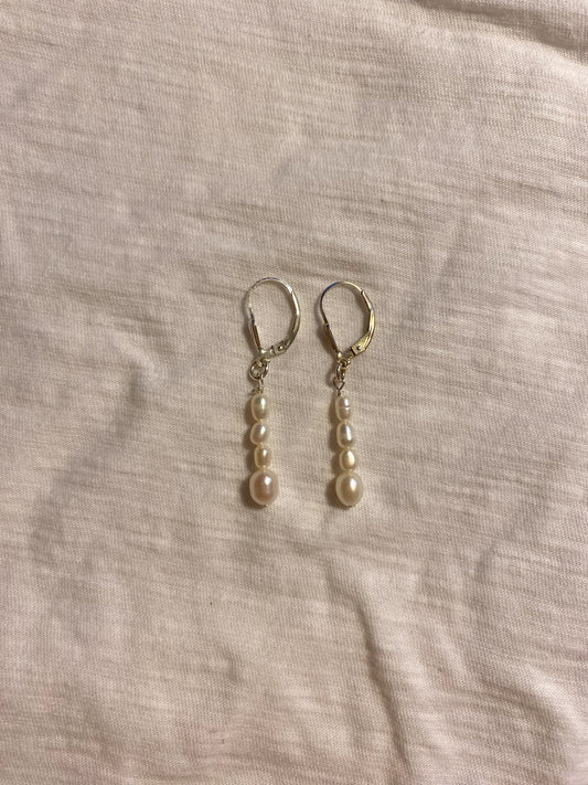 flat lay image of cleo earrings 