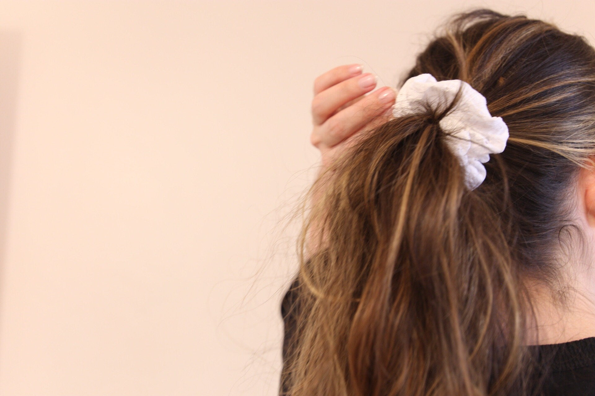 image of high ponytail featuring white eyelet cotton scrunchie 