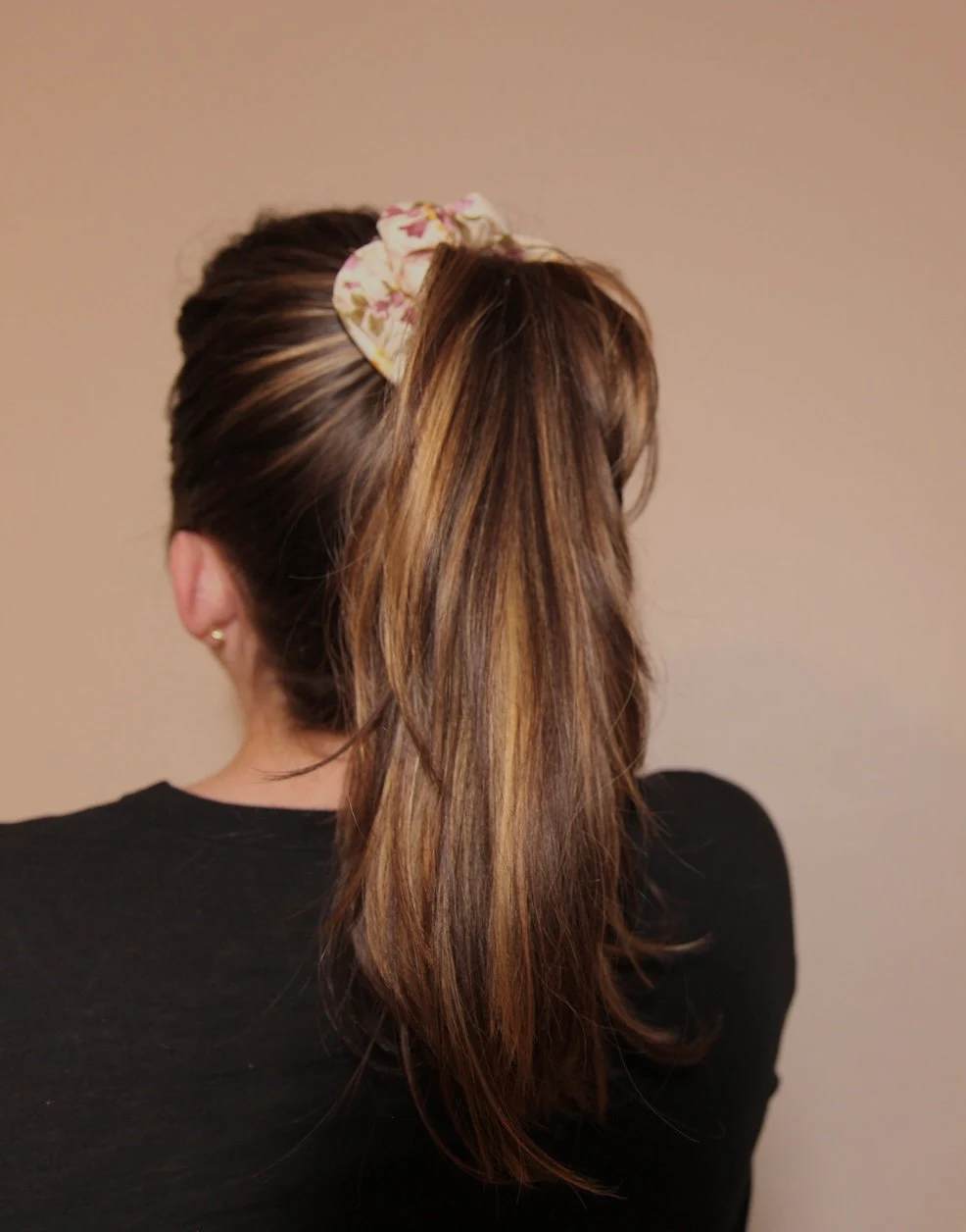 high ponytail featuring lovely lavender satin scrunchie 