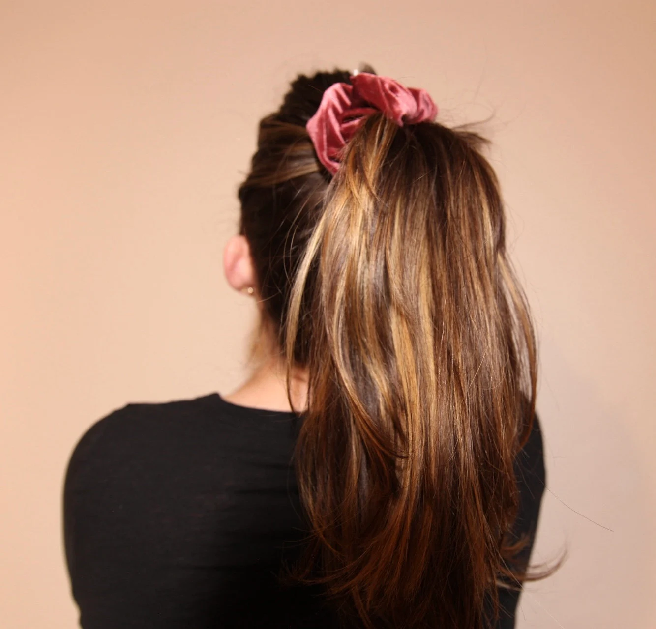 image of high ponytail featuring winter berry velvet scrunchie